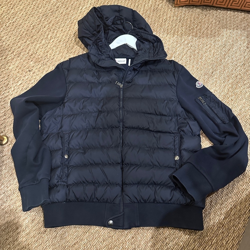 Moncler Woman’s Maglia Cardigan style jacket with hood.